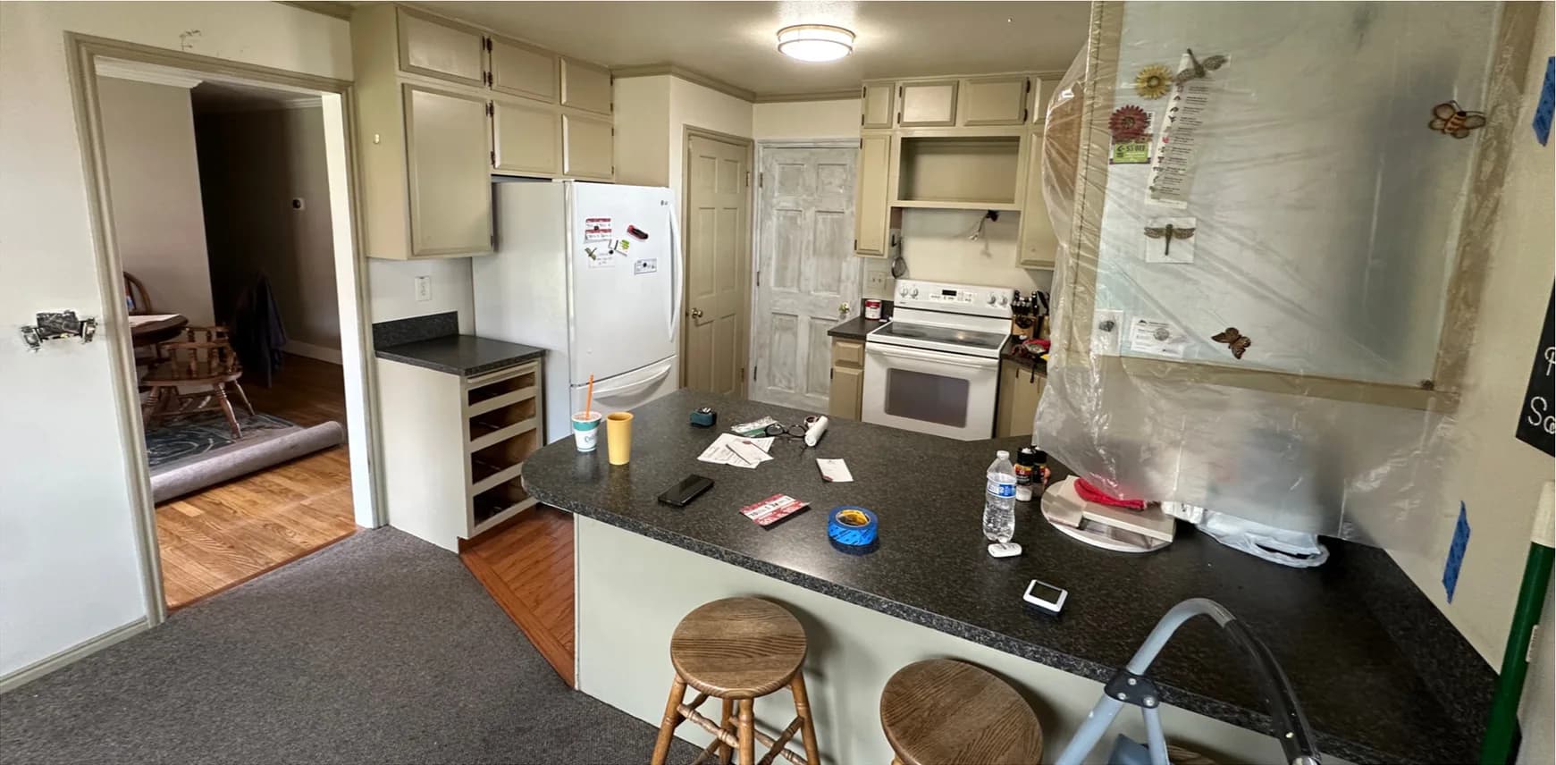 Before: kitchen remodel in Utah, from a closed-off kitchen to an open layout connected to the dining room