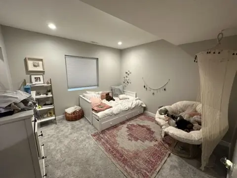 Finished basement with furniture